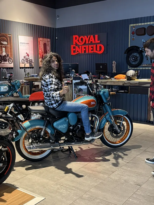 GARAGE customer at the handover of a new Royal Enfield motorcycle