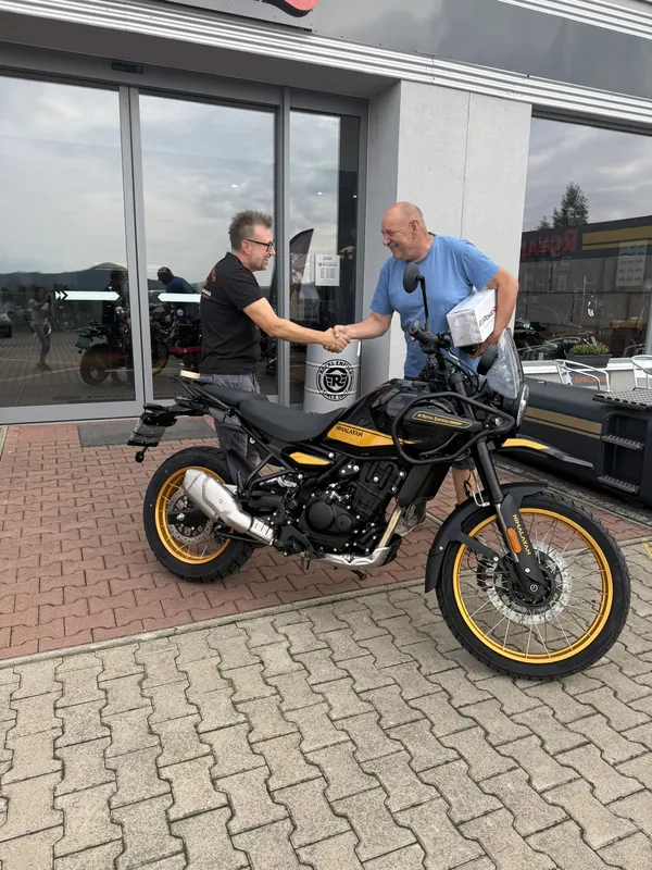 GARAGE customer at the handover of a new Royal Enfield motorcycle