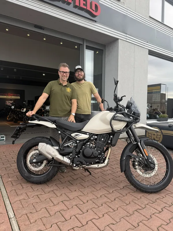 GARAGE customer at the handover of a new Royal Enfield motorcycle