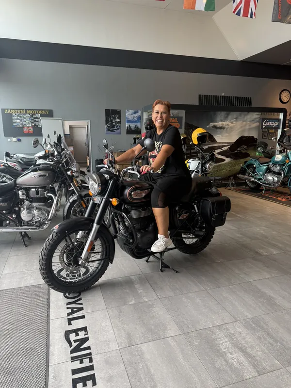 GARAGE customer at the handover of a new Royal Enfield motorcycle