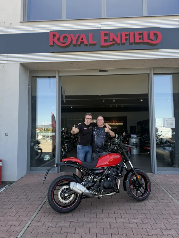 GARAGE customer at the handover of a new Royal Enfield motorcycle
