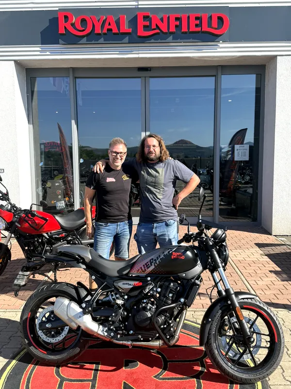 GARAGE customer at the handover of a new Royal Enfield motorcycle