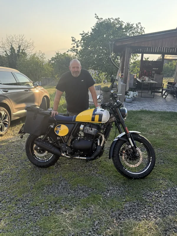 GARAGE customer at the handover of a new Royal Enfield motorcycle
