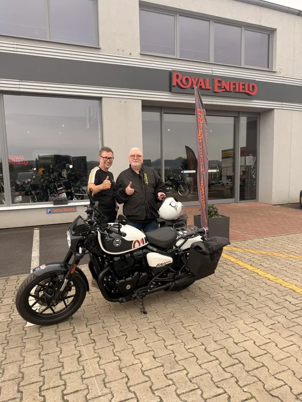 GARAGE customer at the handover of a new Royal Enfield motorcycle