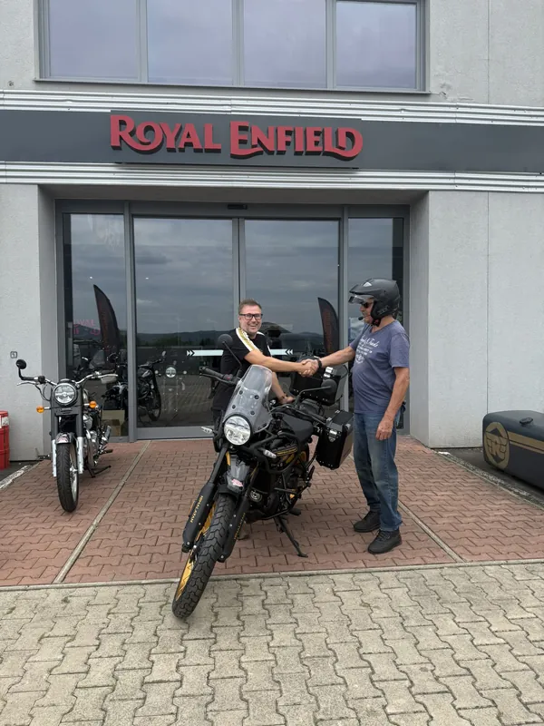 GARAGE customer at the handover of a new Royal Enfield motorcycle