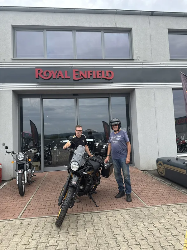 GARAGE customer at the handover of a new Royal Enfield motorcycle