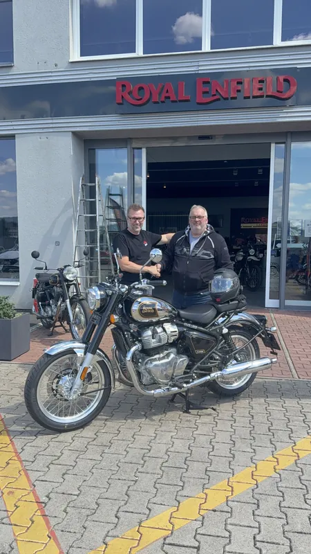 GARAGE customer at the handover of a new Royal Enfield motorcycle