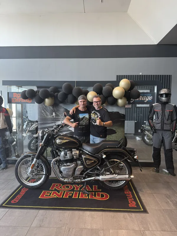 GARAGE customer at the handover of a new Royal Enfield motorcycle