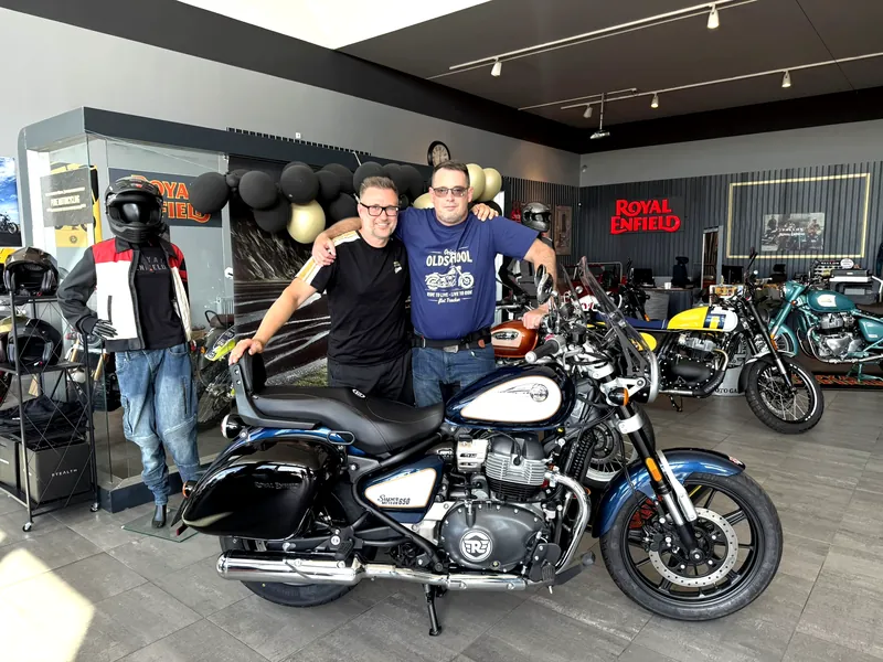 GARAGE customer at the handover of a new Royal Enfield motorcycle