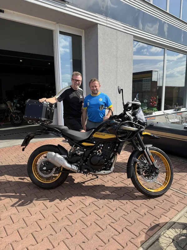 GARAGE customer at the handover of a new Royal Enfield motorcycle