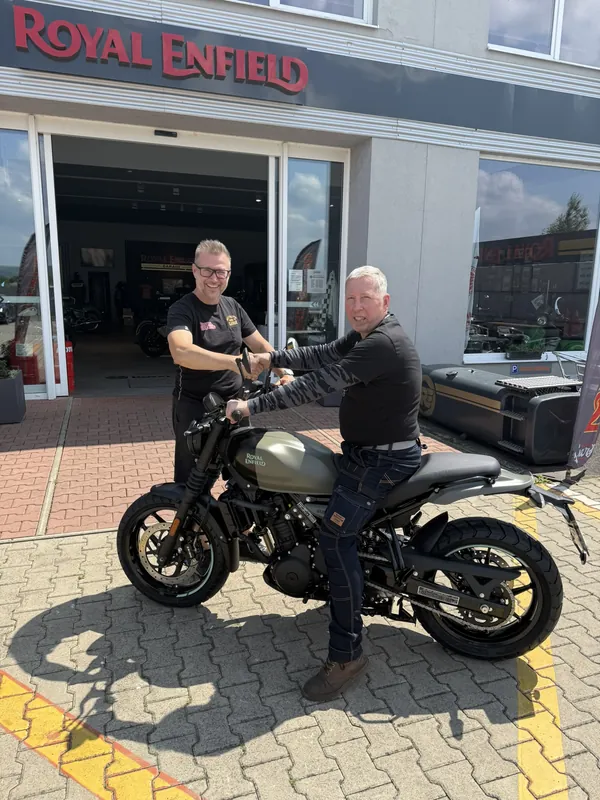 GARAGE customer at the handover of a new Royal Enfield motorcycle