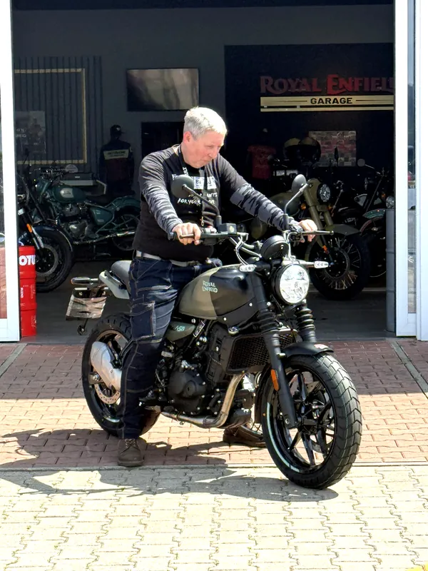 GARAGE customer at the handover of a new Royal Enfield motorcycle