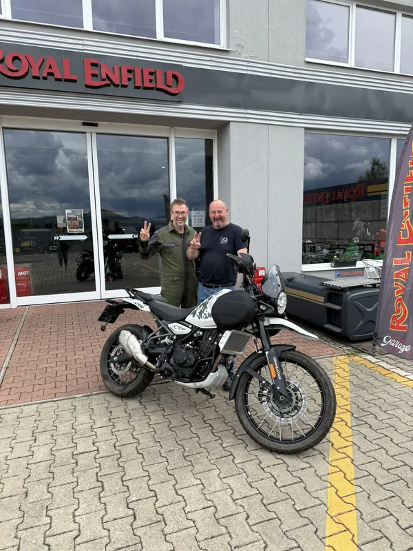 GARAGE customer at the handover of a new Royal Enfield motorcycle
