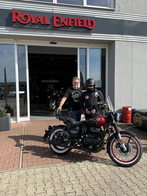 GARAGE customer at the handover of a new Royal Enfield motorcycle
