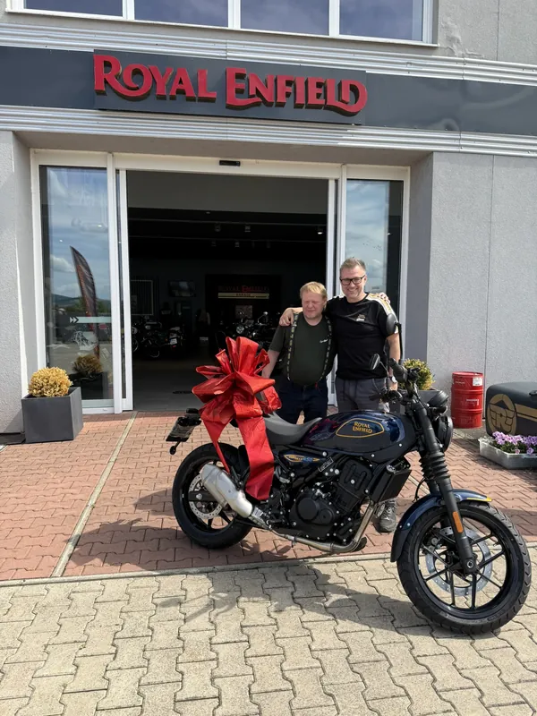 GARAGE customer at the handover of a new Royal Enfield motorcycle