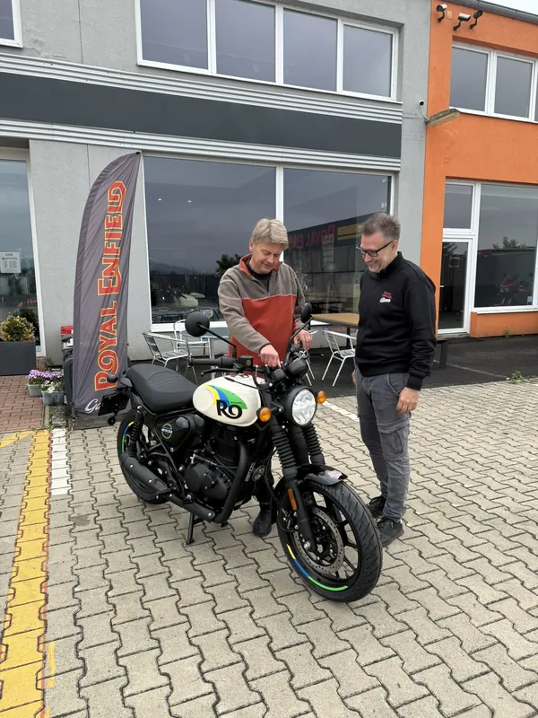 GARAGE customer at the handover of a new Royal Enfield motorcycle
