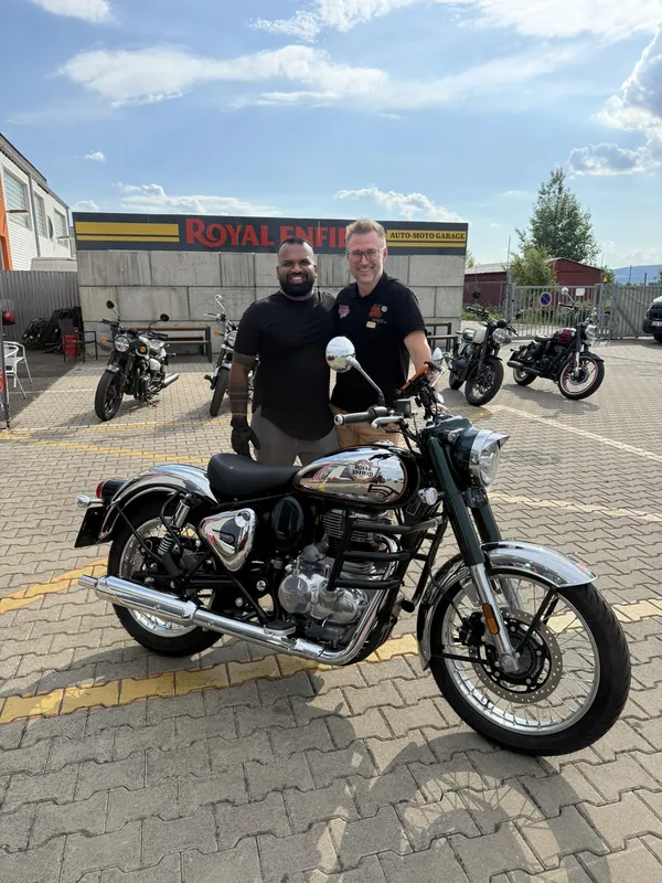 GARAGE customer at the handover of a new Royal Enfield motorcycle