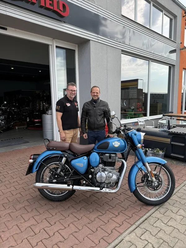 GARAGE customer at the handover of a new Royal Enfield motorcycle