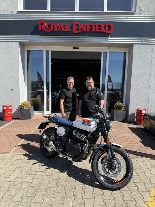 GARAGE customer at the handover of a new Royal Enfield motorcycle