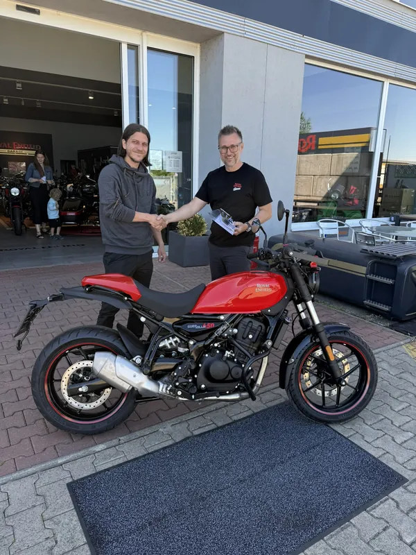 GARAGE customer at the handover of a new Royal Enfield motorcycle