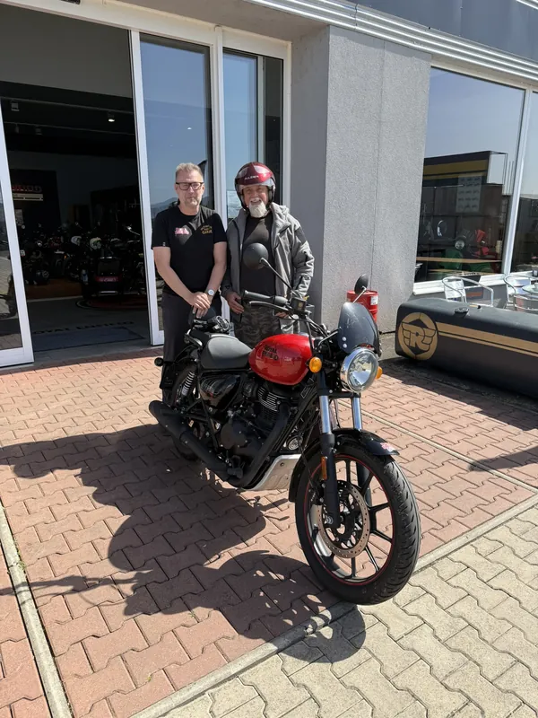 GARAGE customer at the handover of a new Royal Enfield motorcycle