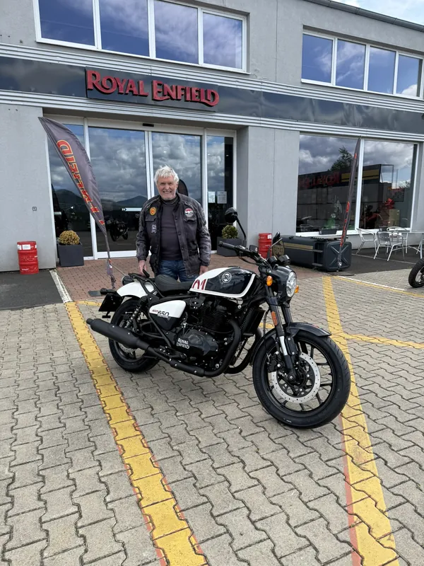 GARAGE customer at the handover of a new Royal Enfield motorcycle