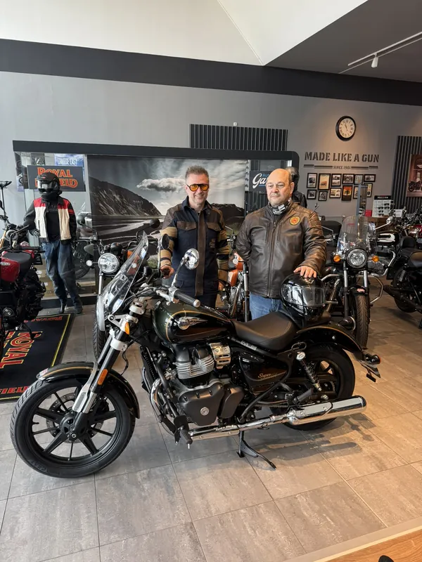 GARAGE customer at the handover of a new Royal Enfield motorcycle
