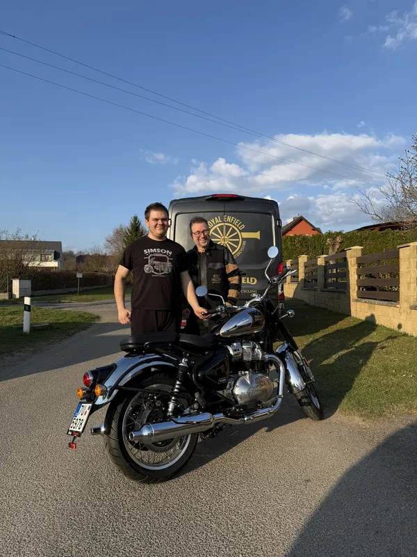 GARAGE customer at the handover of a new Royal Enfield motorcycle