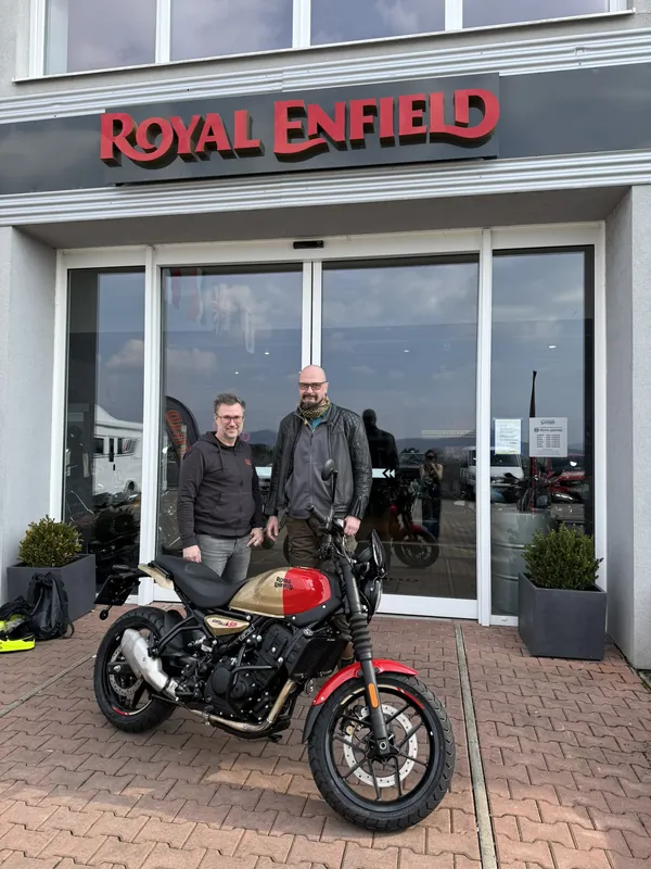 GARAGE customer at the handover of a new Royal Enfield motorcycle