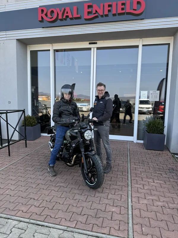 GARAGE customer at the handover of a new Royal Enfield motorcycle