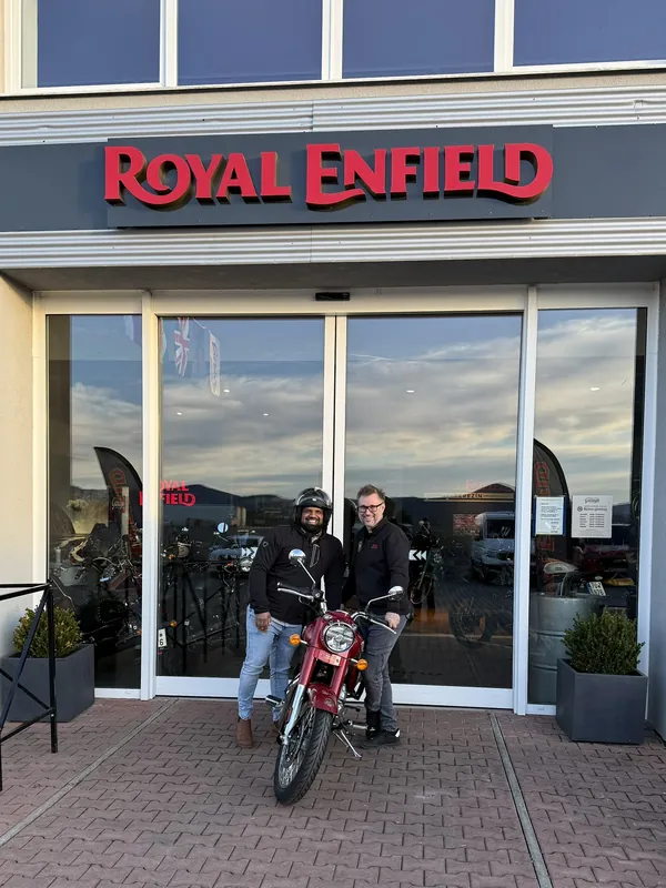 GARAGE customer at the handover of a new Royal Enfield motorcycle