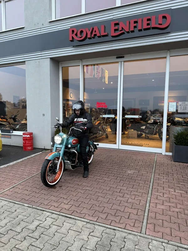 GARAGE customer at the handover of a new Royal Enfield motorcycle