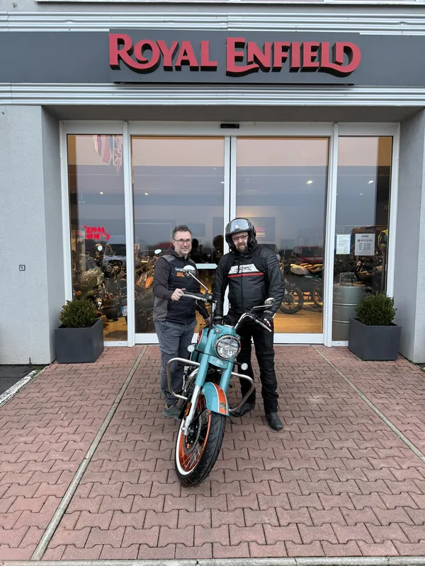 GARAGE customer at the handover of a new Royal Enfield motorcycle