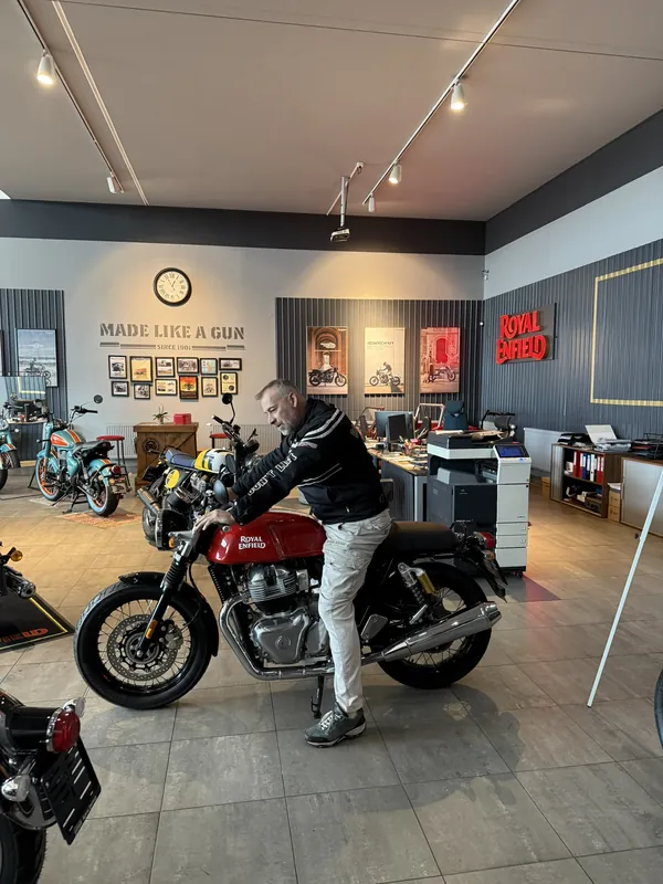 GARAGE customer at the handover of a new Royal Enfield motorcycle