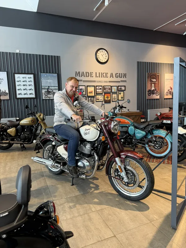 GARAGE customer at the handover of a new Royal Enfield motorcycle