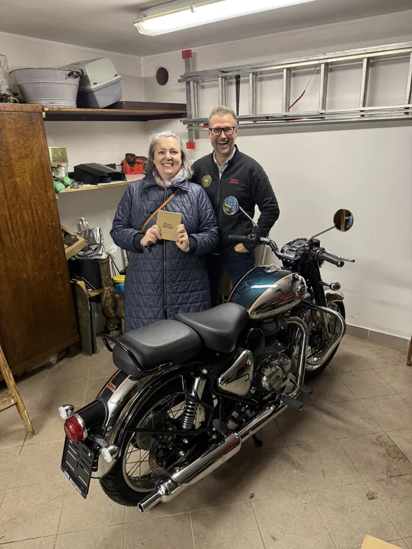GARAGE customer at the handover of a new Royal Enfield motorcycle