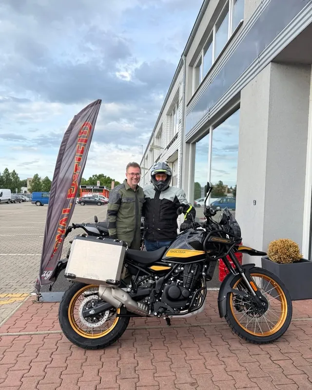 GARAGE customer at the handover of a new Royal Enfield motorcycle