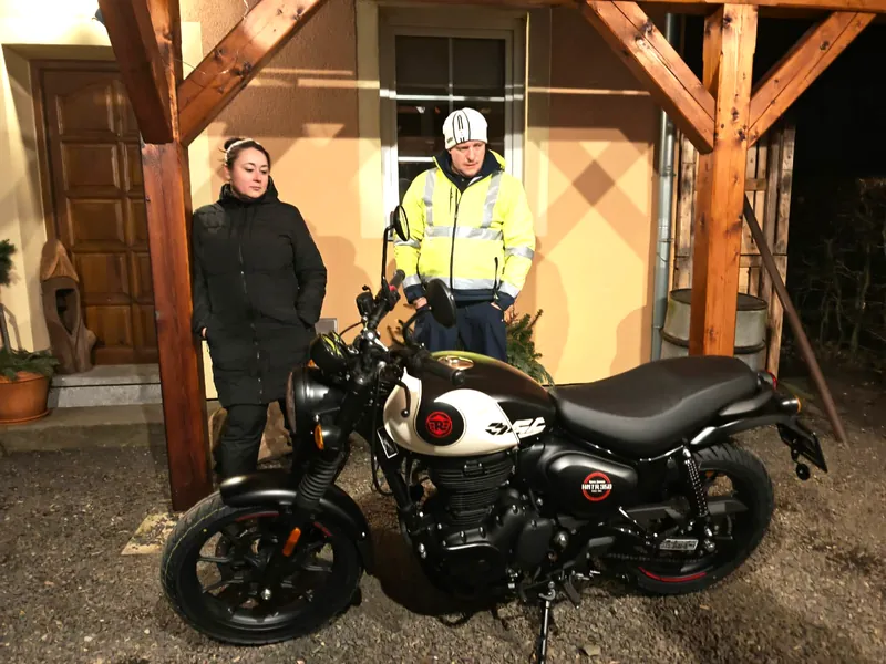 GARAGE customer at the handover of a new Royal Enfield motorcycle