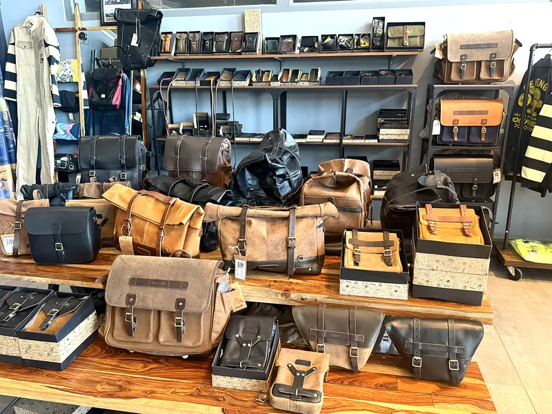 Leather bags on a wooden table