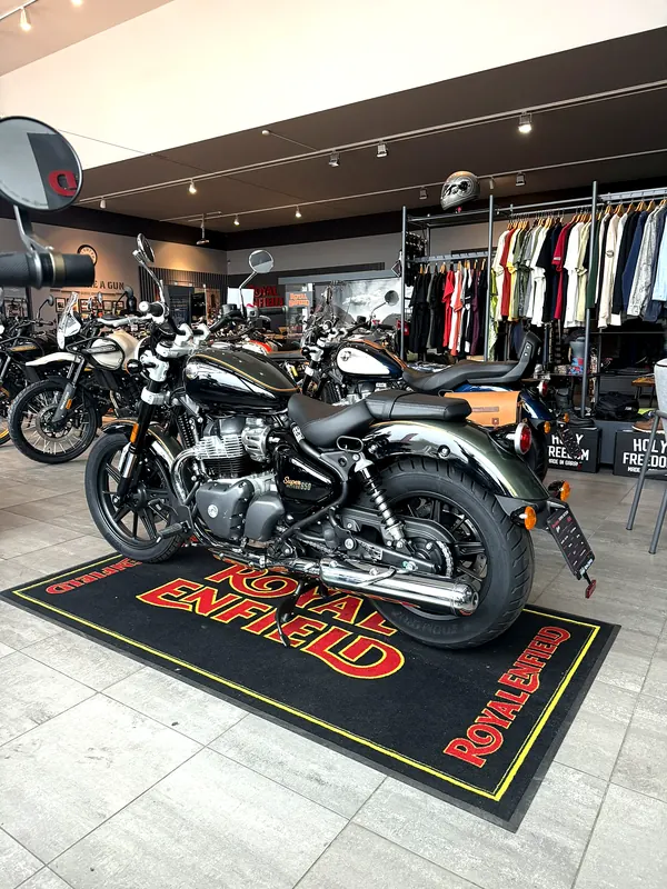 A motorcycle and clothing in the showroom