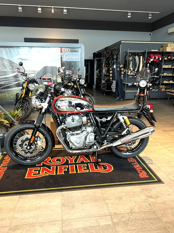 A Royal Enfield motorcycle on a carpet