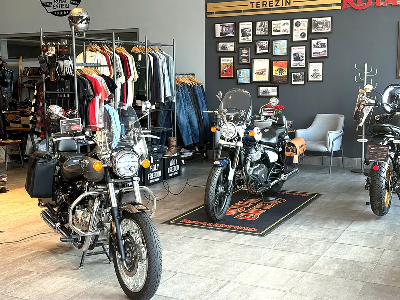 Motorcycles and clothing by the Terezín wall