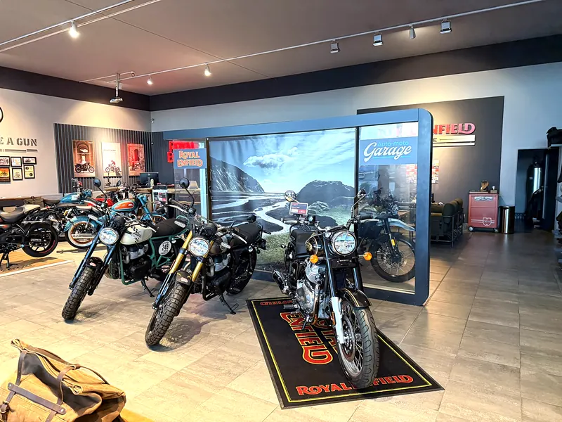 Motorcycles by the GARAGE wall