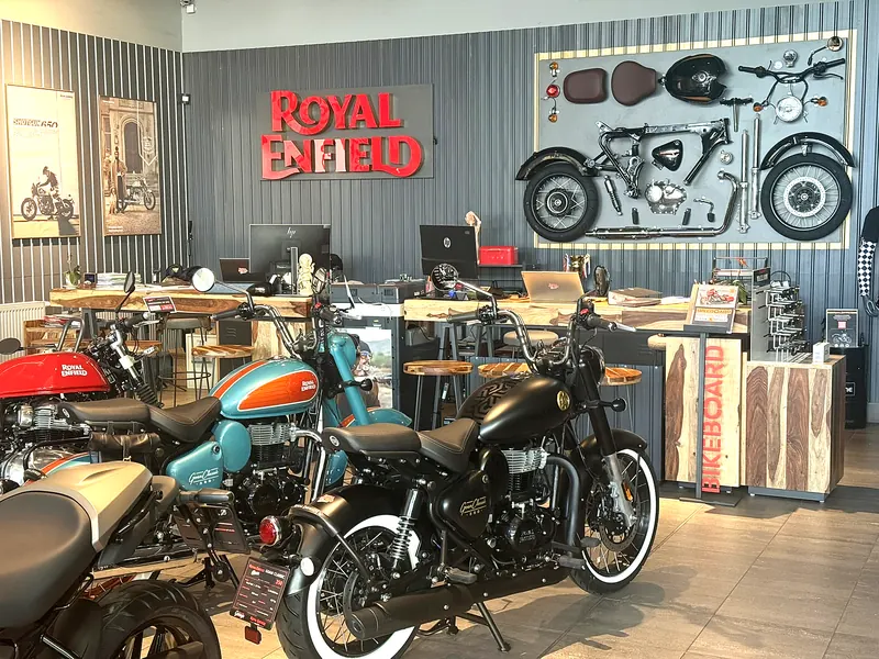 Counter with the Royal Enfield logo and motorcycles
