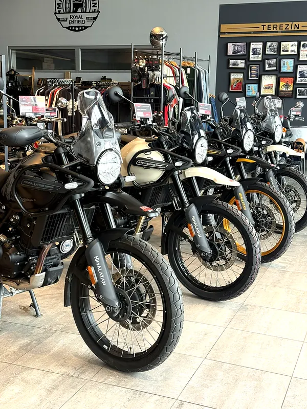 A row of Royal Enfield touring motorcycles