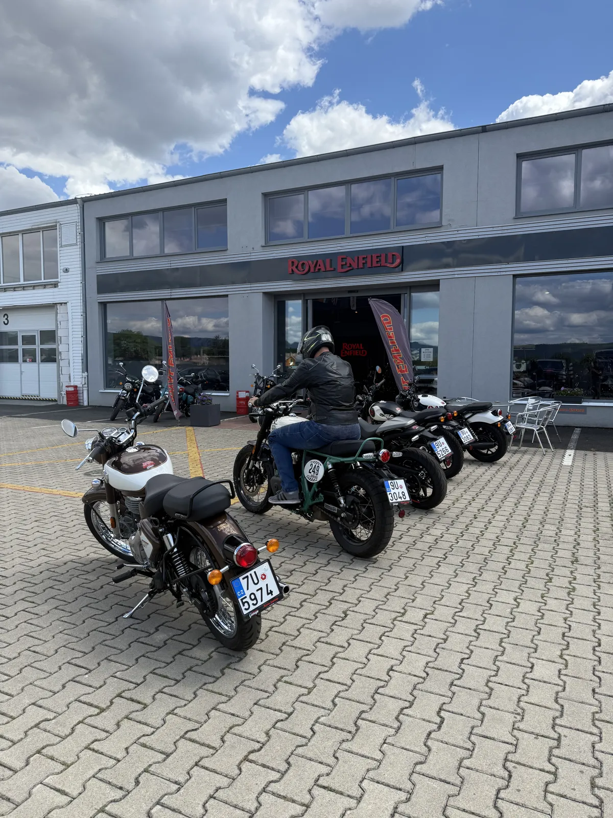 GARAGE customer at the handover of a new Royal Enfield motorcycle