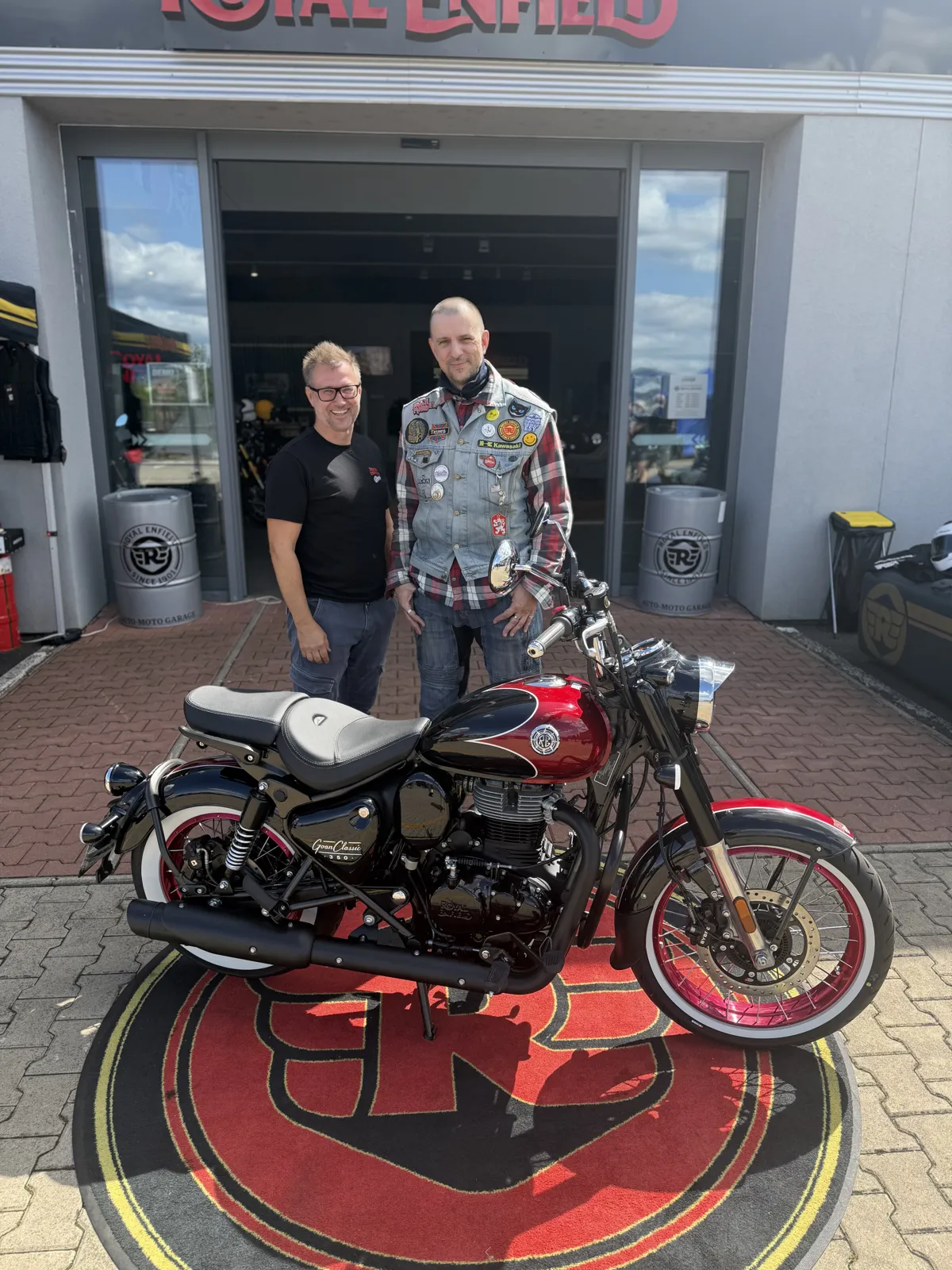 GARAGE customer at the handover of a new Royal Enfield motorcycle