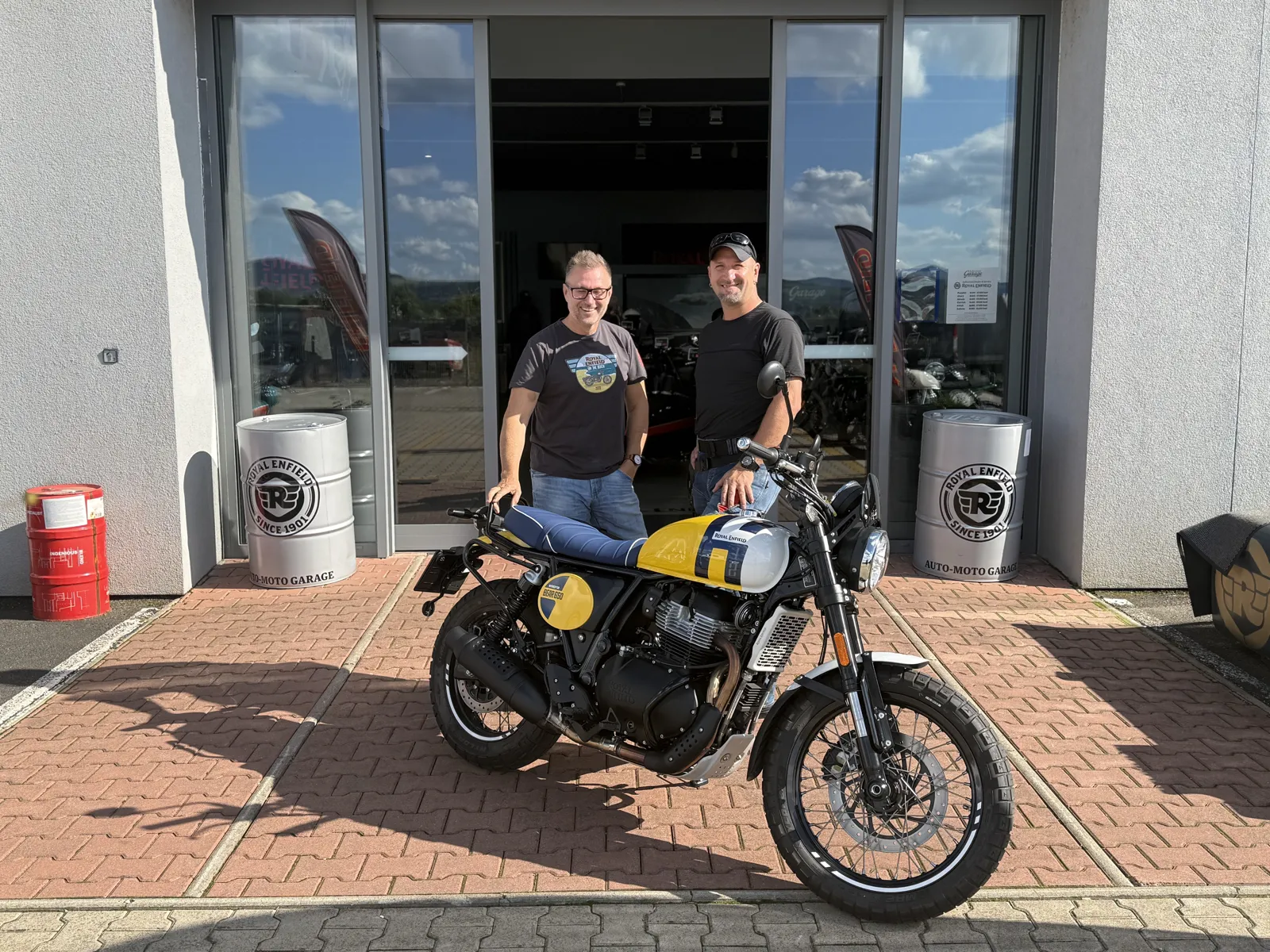 GARAGE customer at the handover of a new Royal Enfield motorcycle